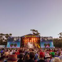 Crowd of hundreds standing in front of the Harvest Rock main stage
