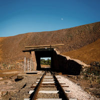 Historic railway track passing through a stone and timber tunnel at Moonta Mines on the Yorke Peninsula